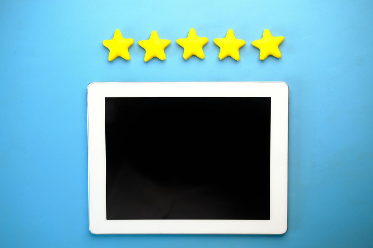 Tablet with five star rating graphic