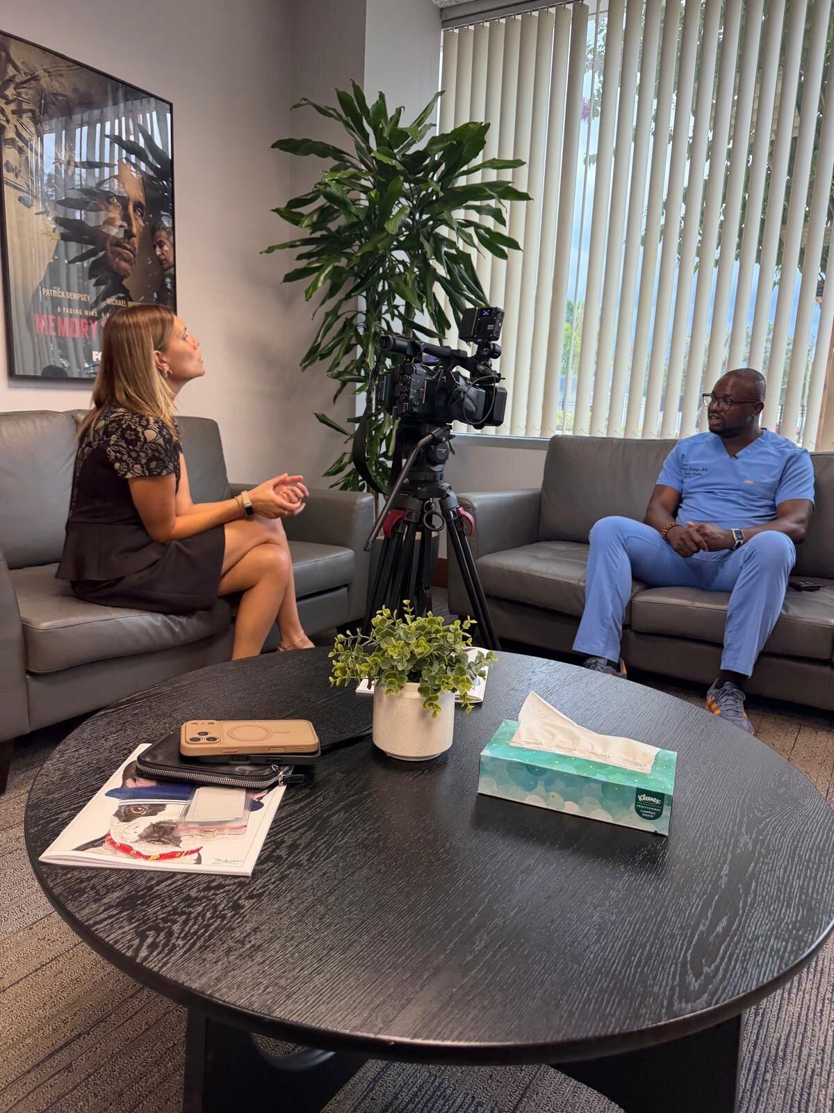 Camera set up to film a physician interview in a practice office